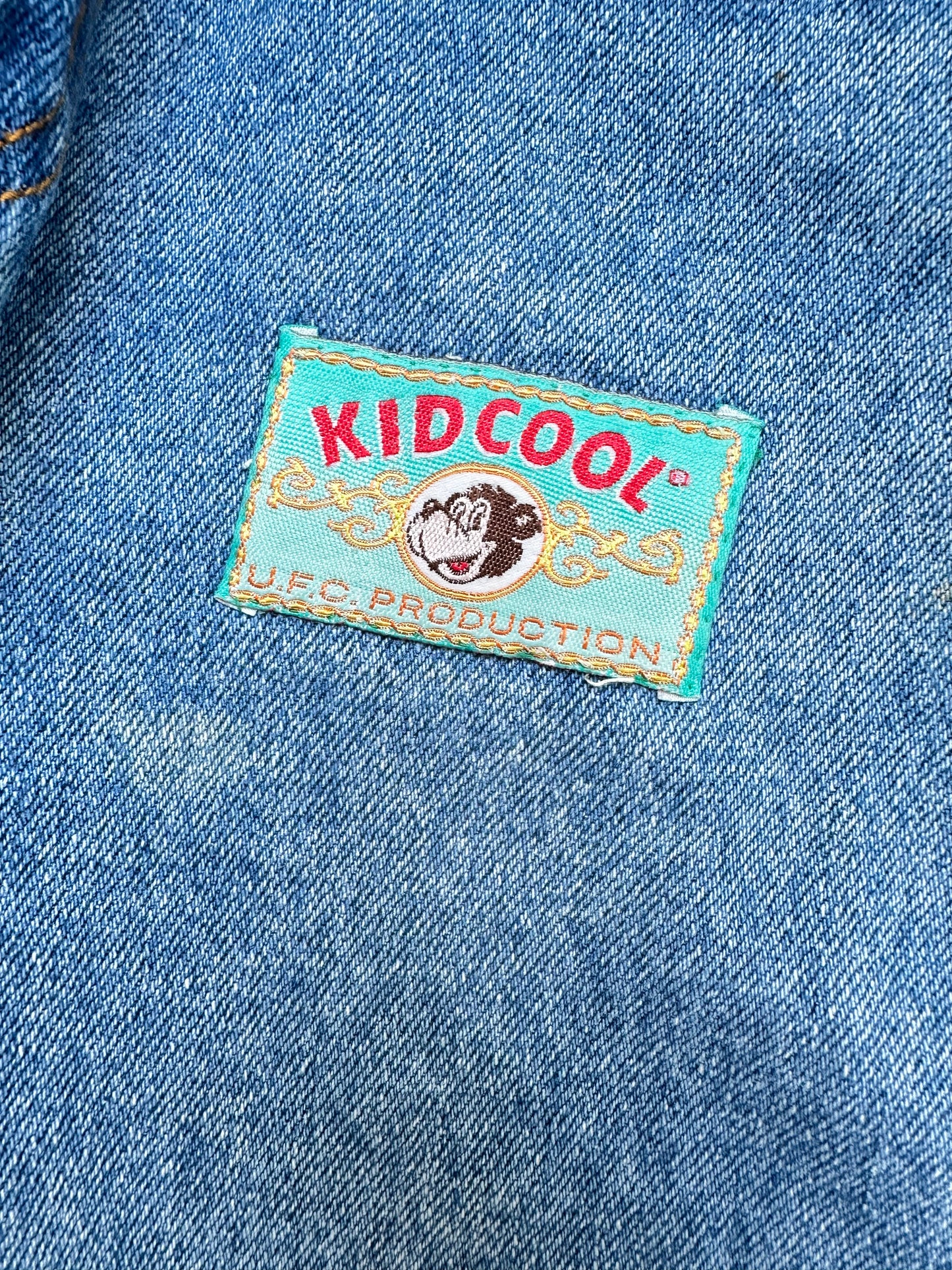 Kids Vintage cut-off denim shorts, with badge details, Age 4-5 years.