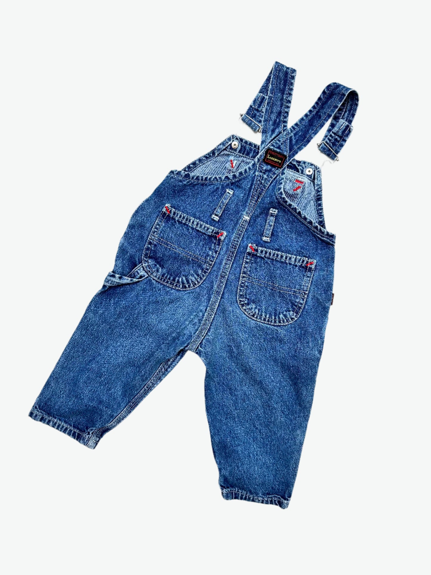 kids vintage denim dungarees by brand Liberto, true blue denim shade, faded in all the right places. Highlight red bartacks. Age 1 yrs.