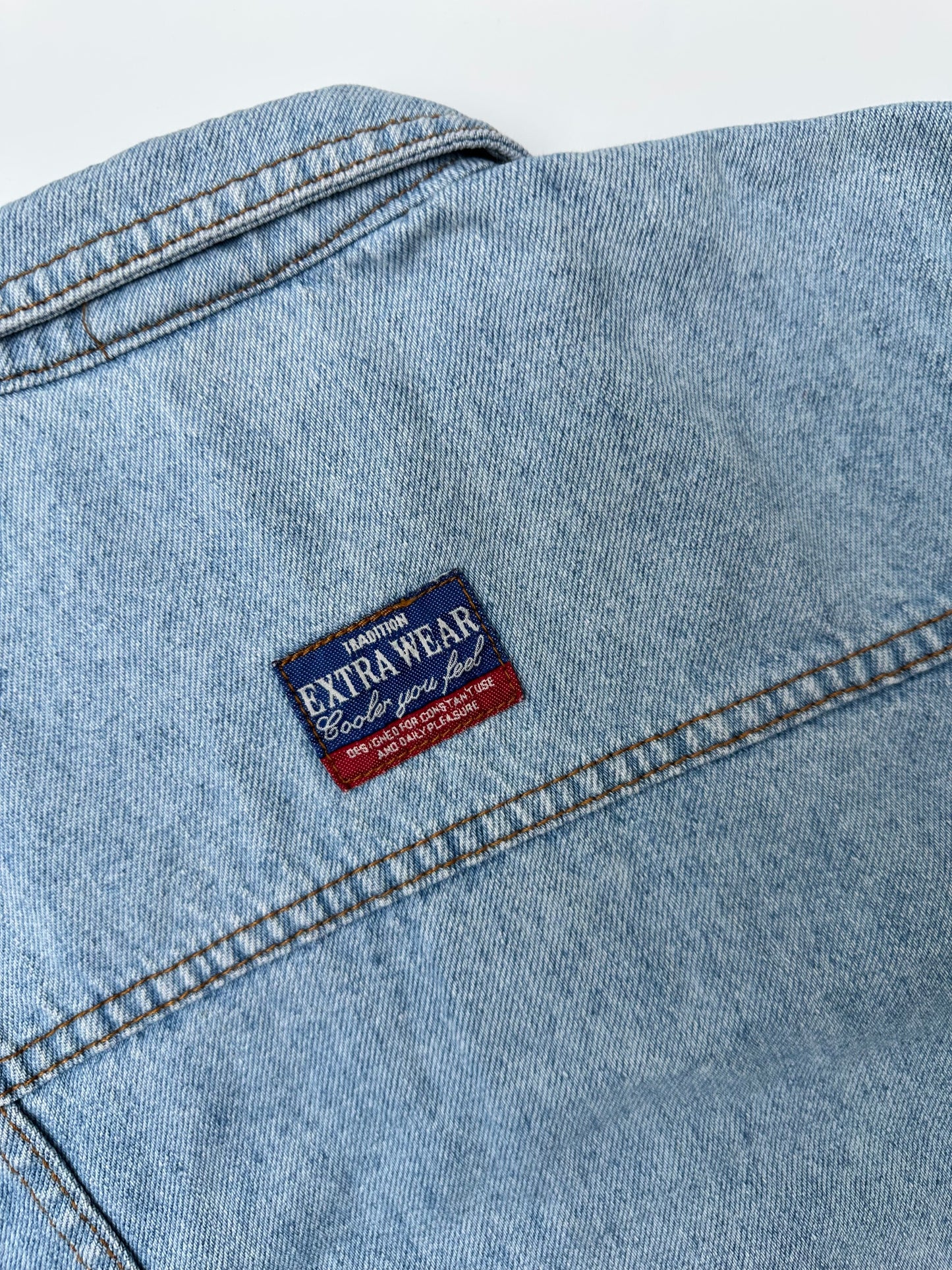 Kids vintage Denim jacket with stripe and gingham details and badges in a light wash. Age 5 years.