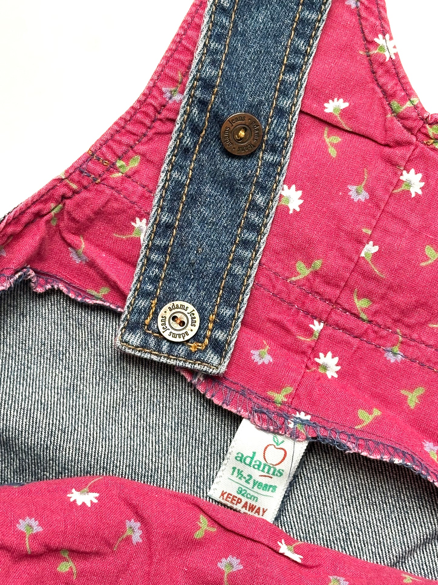 Kids vintage denim dungarees. In a dark denim with floral highlights. Age 18-24 months.