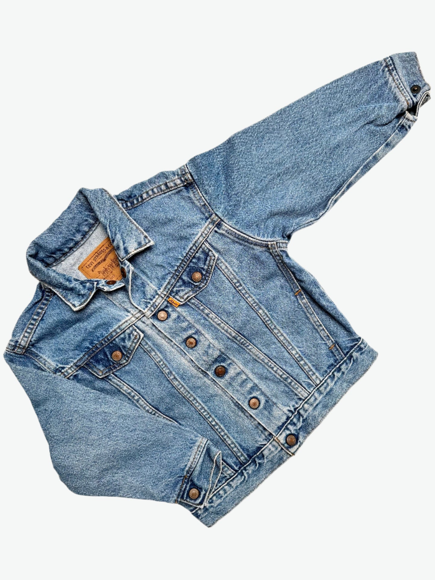 Kids vintage Levi's orange tab denim jacket. Authentically worn in classic trucker jacket. Easy popper fastening. Age 6 yrs.