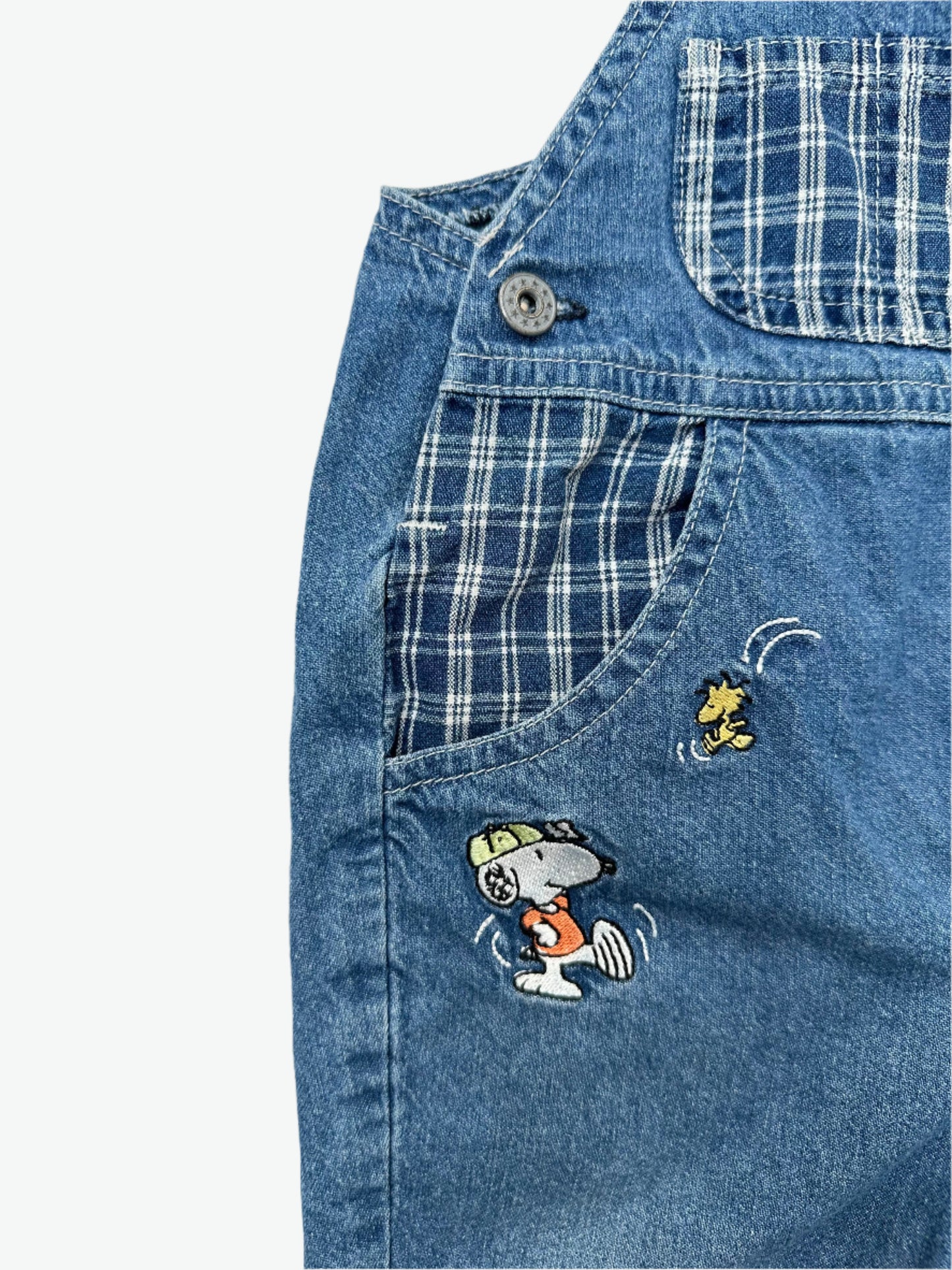 Kids vintage Snoopy lightweight denim dungarees with embroidery and check details. Classic dungaree styling with popper fastening. Age 1 years.