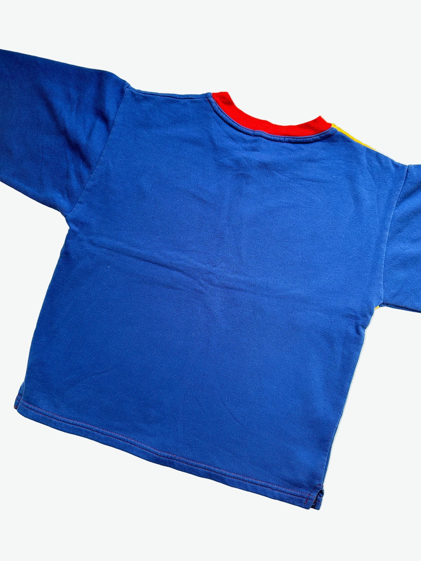 Kids vintage jumper branded Tamagotchi. Multi colour - red, blue and yellow, printed detail from 1996-1997. Age 10 years.