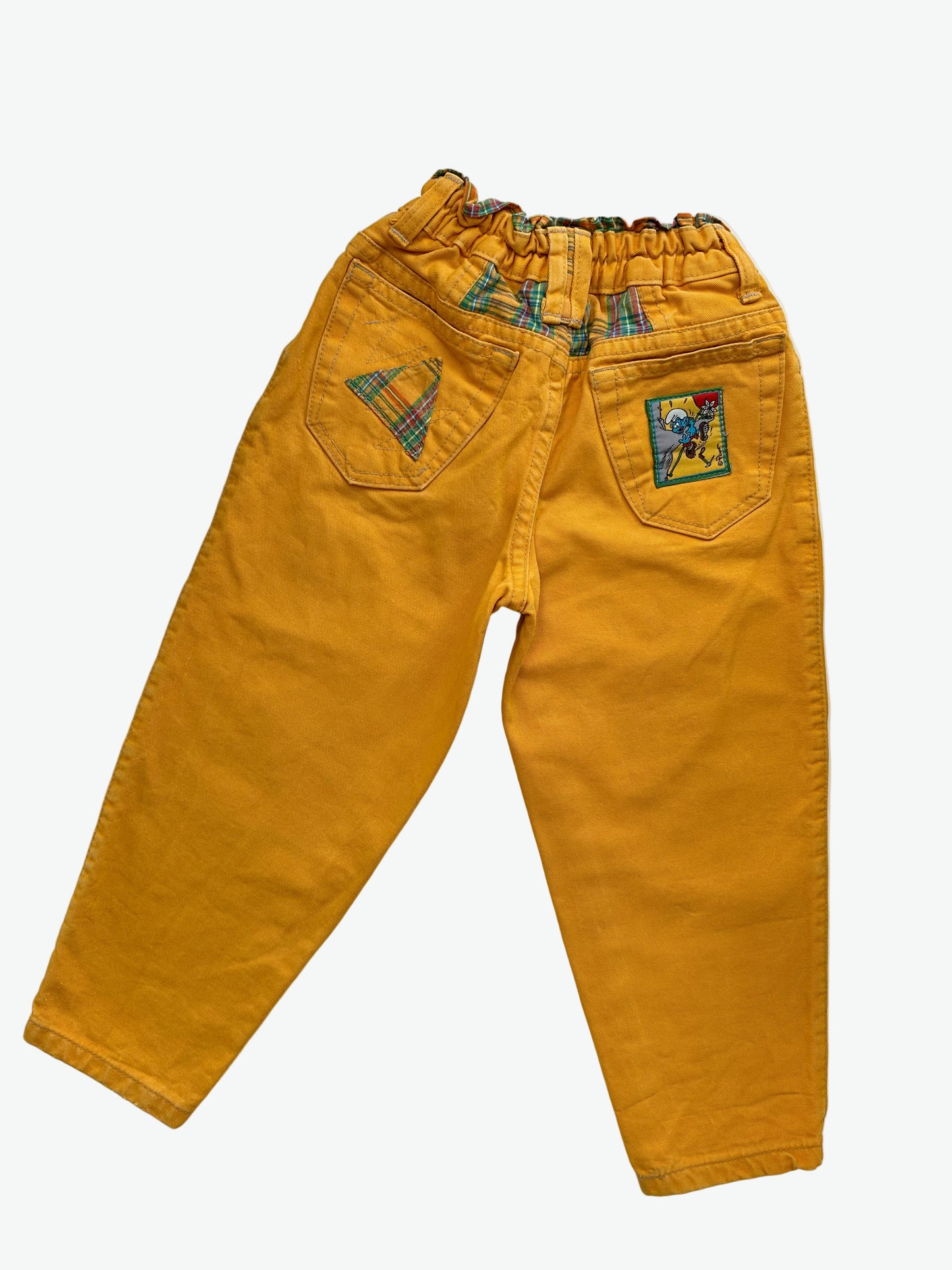Kids vintage yellow trousers with smurf badge detail on back pocket and embroidery on the front. Tapered shape. Age 3-4 years/ 104cm.
