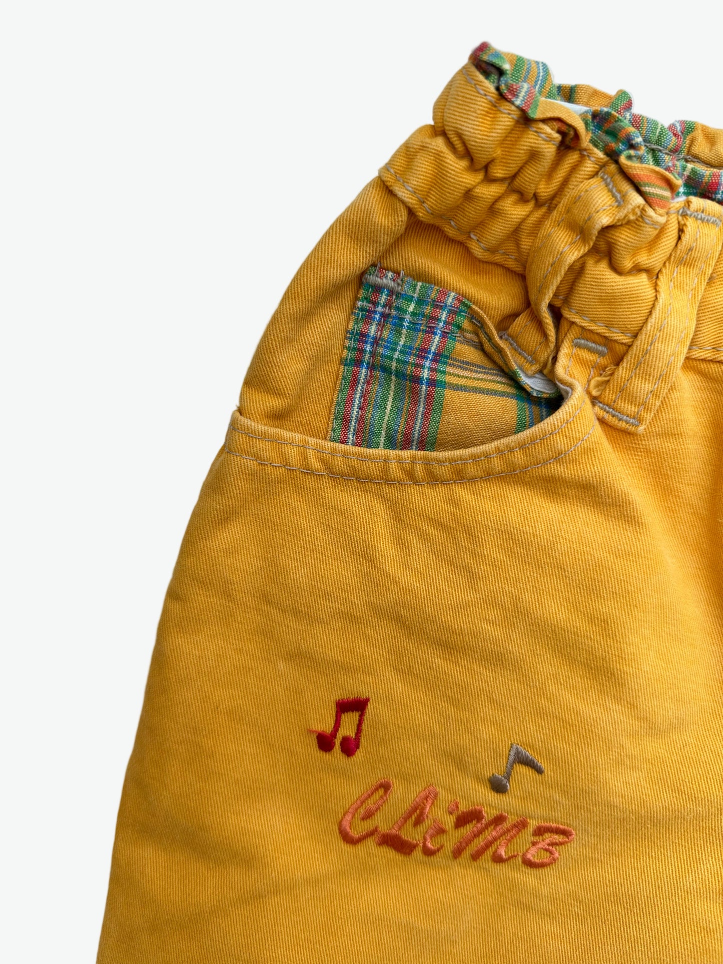 Kids vintage yellow trousers with smurf badge detail on back pocket and embroidery on the front. Tapered shape. Age 3-4 years/ 104cm.