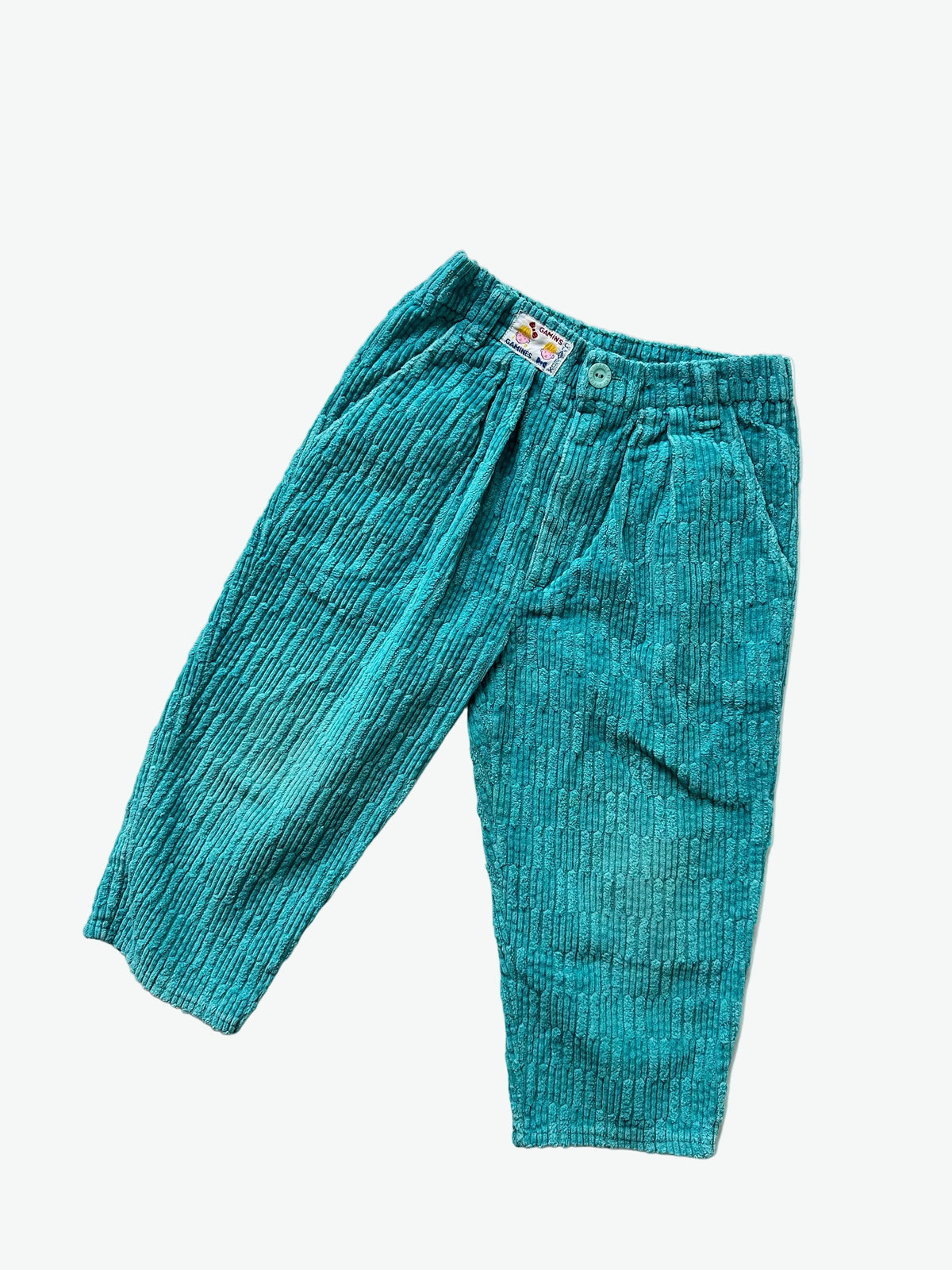 kids vintage teal corduroy trousers on a white background