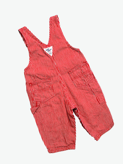 Red and white striped overalls on a white background