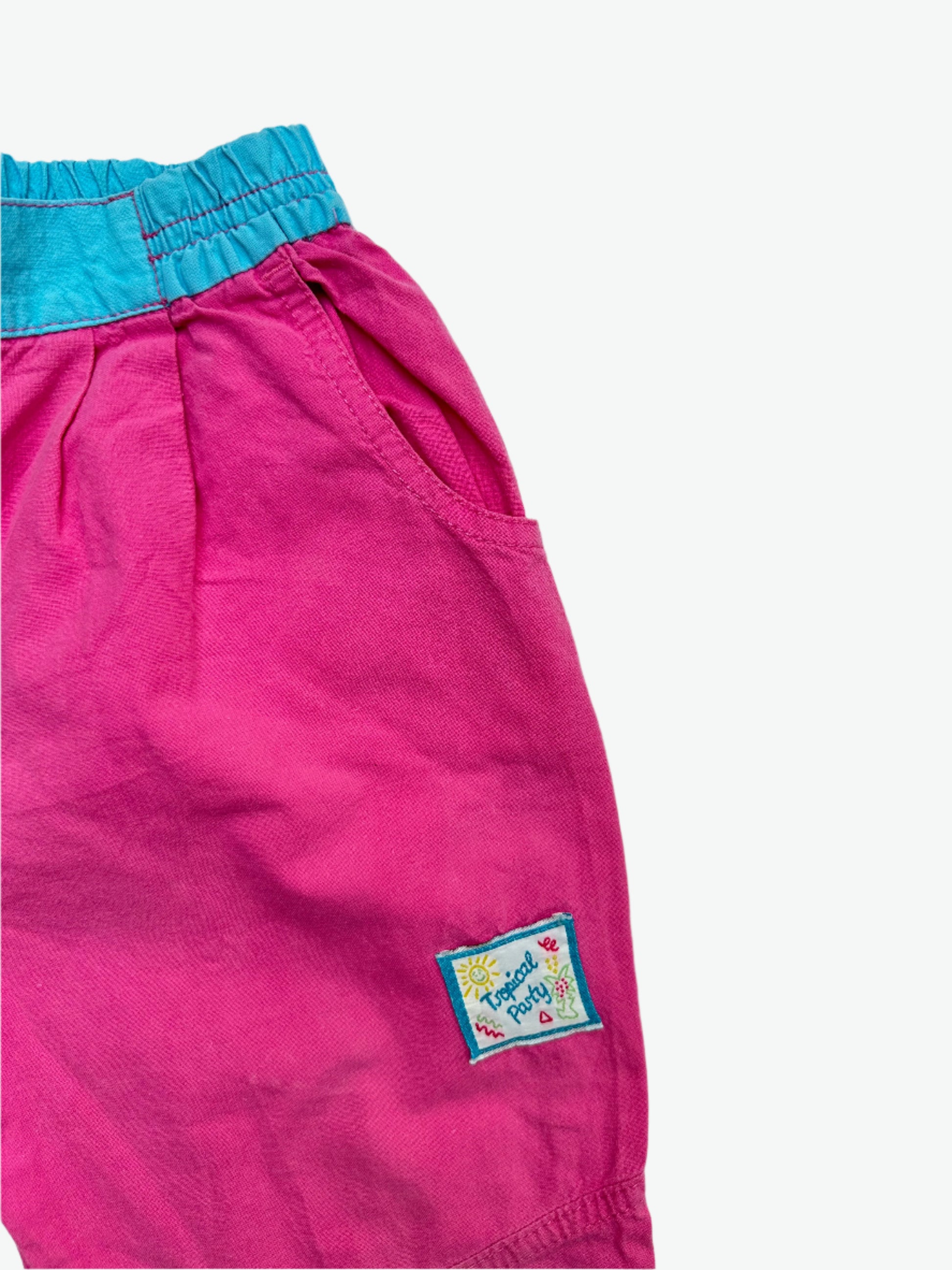 Kids vintage lightweight trouser in a pink with blue waistband from Ladybird. In a relaxed fit with elasticated waist and badge detail on the thigh. Age 2-3 yrs.
