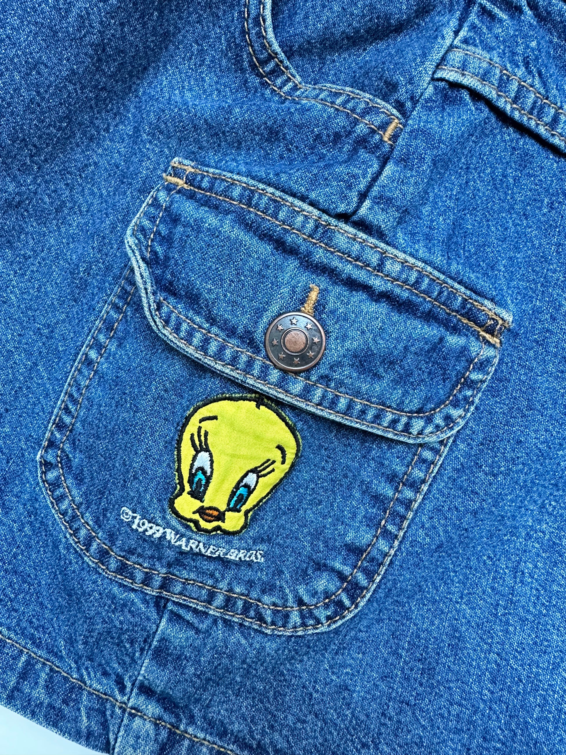 Kids vintage 90's Tweedy denim skirt, with front button opening and cargo pockets, Tweedy bird embroidery on the side, age 7 years.