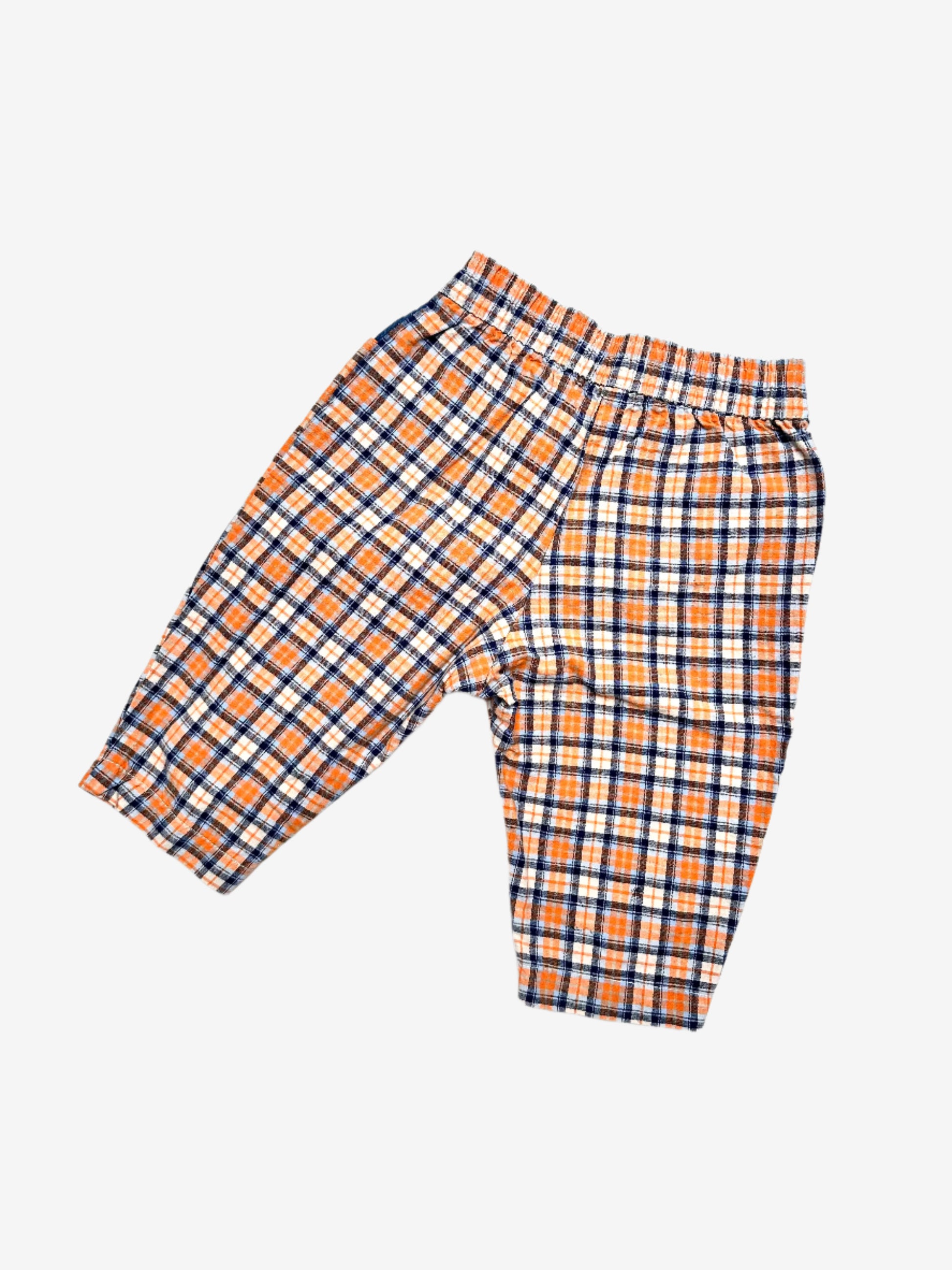 Kids Vintage 90's Check Trousers with Tom & Jerry embroidered detail. Easy elastic waistband in relaxed fit. Lightweight fabric. 