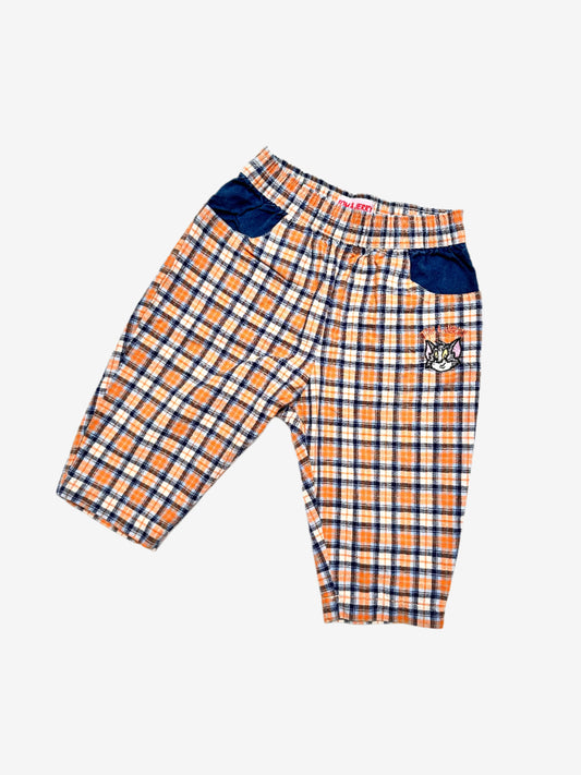 Kids Vintage 90's Check Trousers with Tom & Jerry embroidered detail. Easy elastic waistband in relaxed fit. Lightweight fabric. 