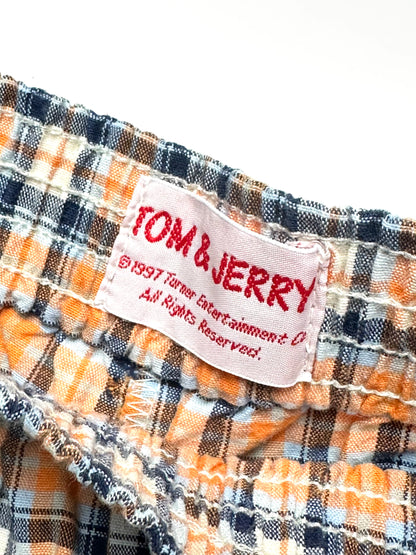 Kids Vintage 90's Check Trousers with Tom & Jerry embroidered detail. Easy elastic waistband in relaxed fit. Lightweight fabric. Label 1997.