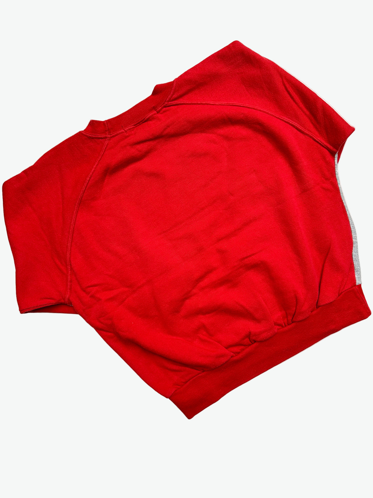 Grey and red sweater jumper with cartoon character boule & bill design on a white background