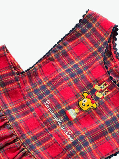 Red check dress with embroidery character on the front on a white background