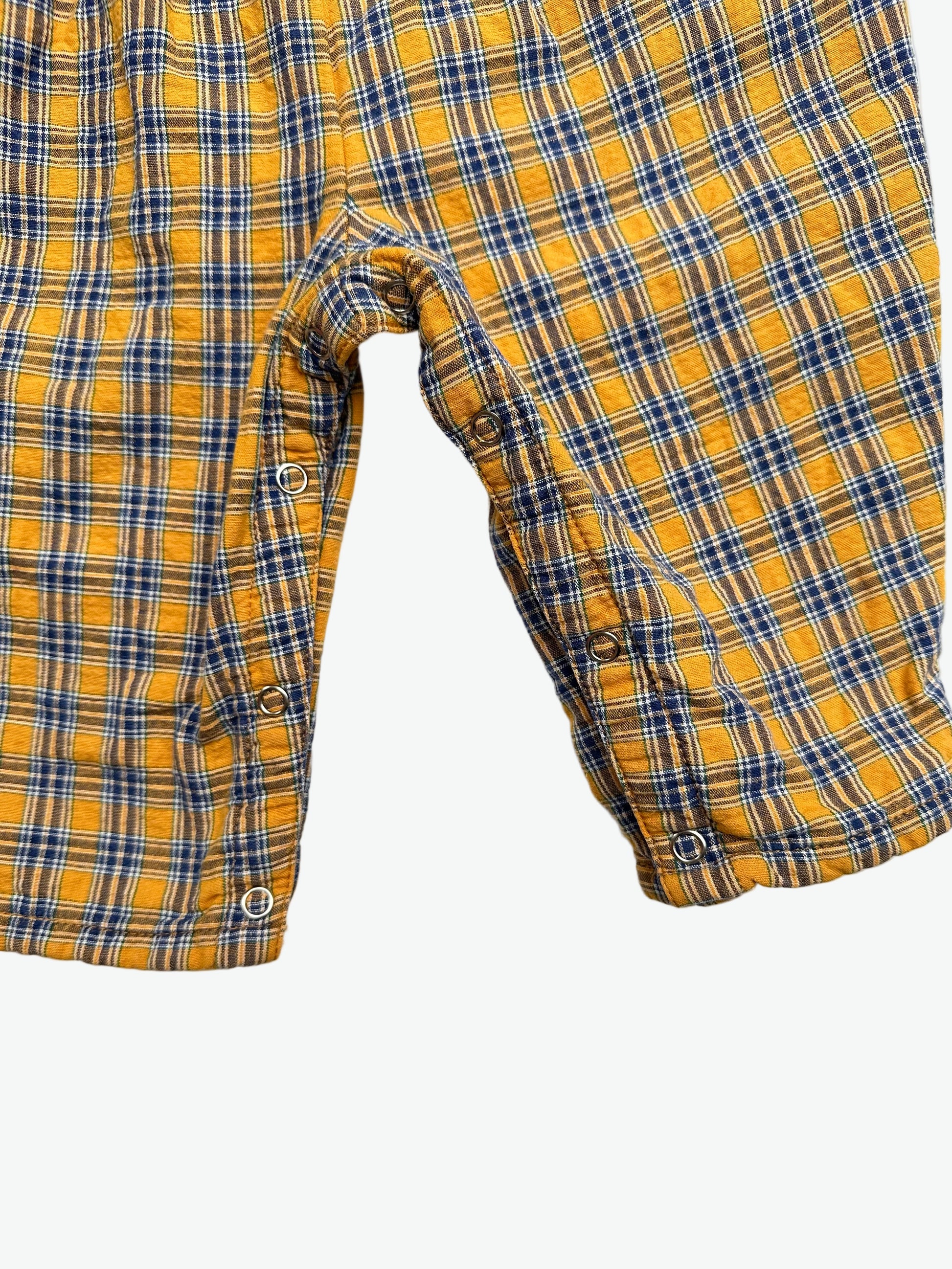 Yellow and blue Check dungarees with badge on a white background