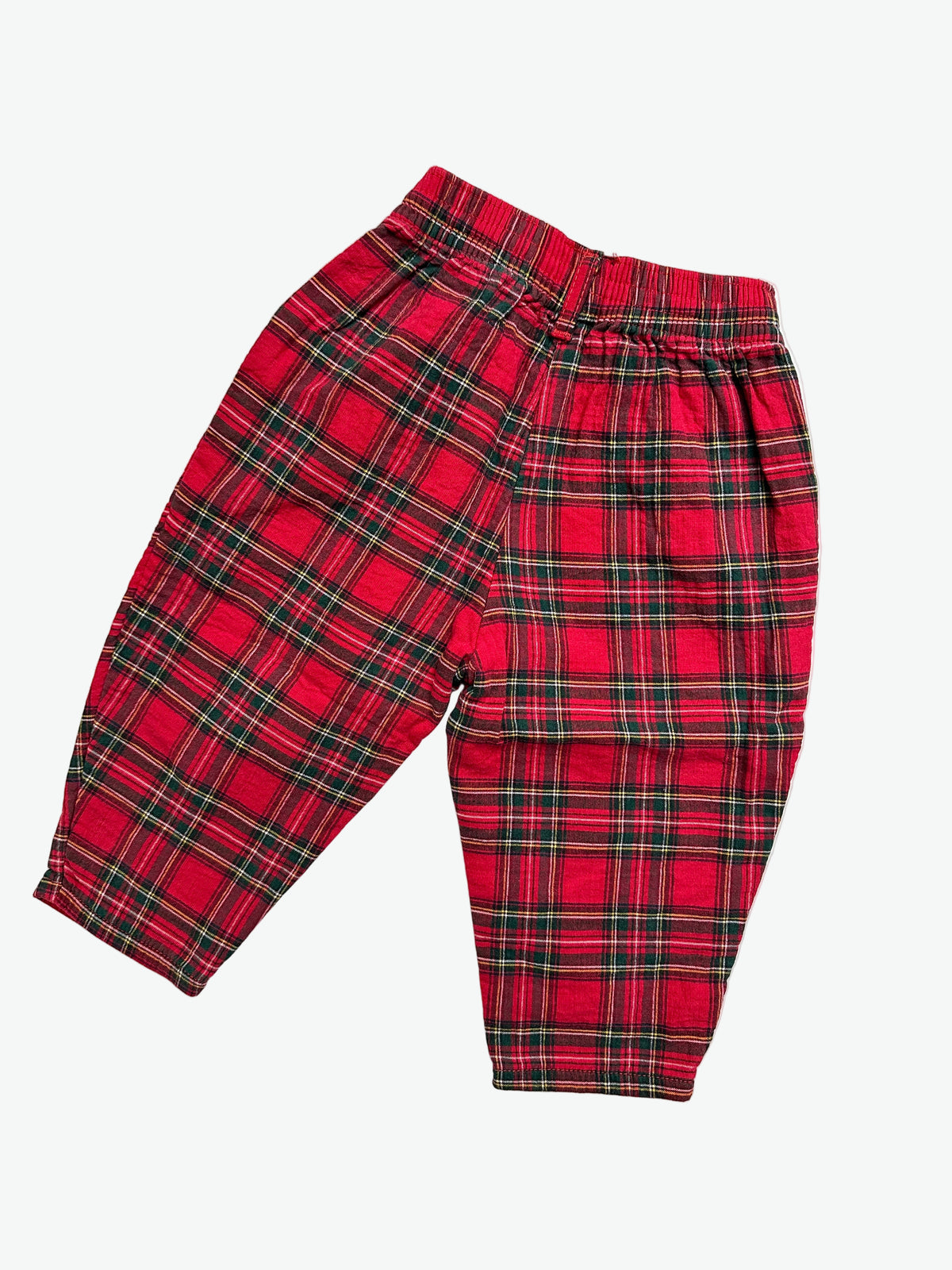 Kids vintage red check trousers on a white background