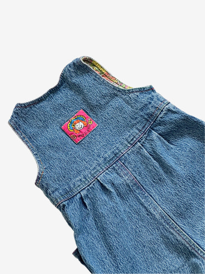 Kids vintage 90's Acid Wash Denim Romper  from British brand Adams, with rainbow stitching, pink buttons and a jazzy lining. Age 12 Months.