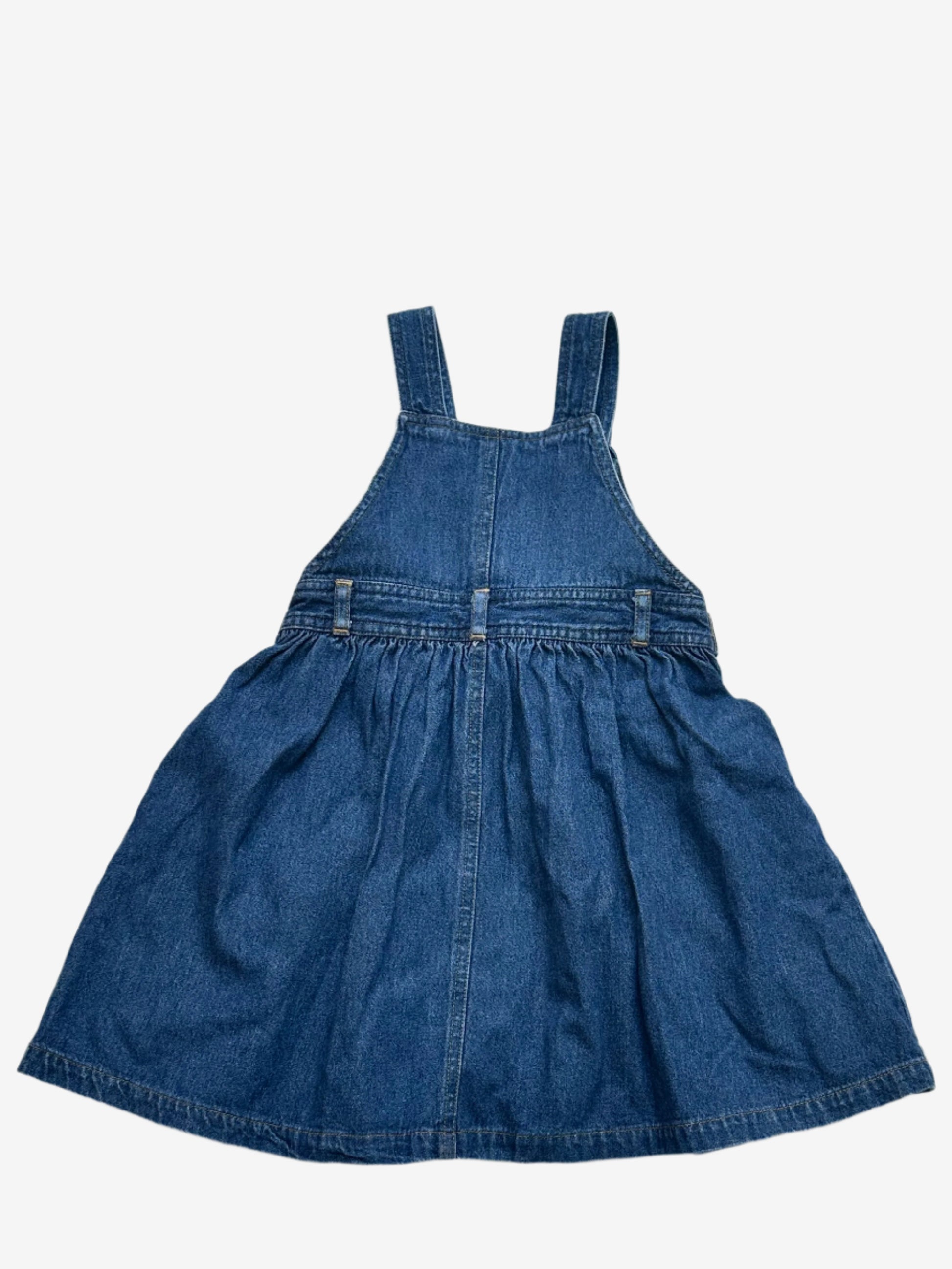 Kids vintage Denim Dress from British brand Adams from the 90s. Adjustable button strap closure with a full a-line skirt perfectly girly with simple flower embroidery at the front, flower embossed buttons and tie.Age 18-24 Months.