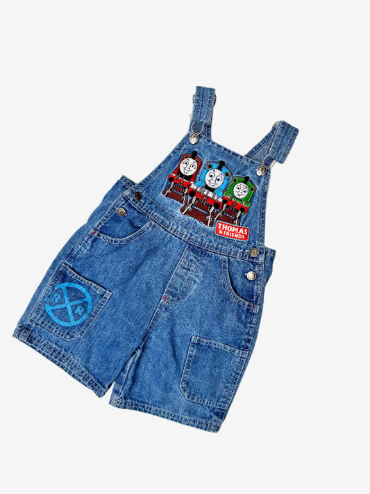 Kids Vintage Thomas the Tank Engine Short Dungarees in denim with detailed thomas and friends embroidery on the chest and branded T buttons. Age 2 yrs.
