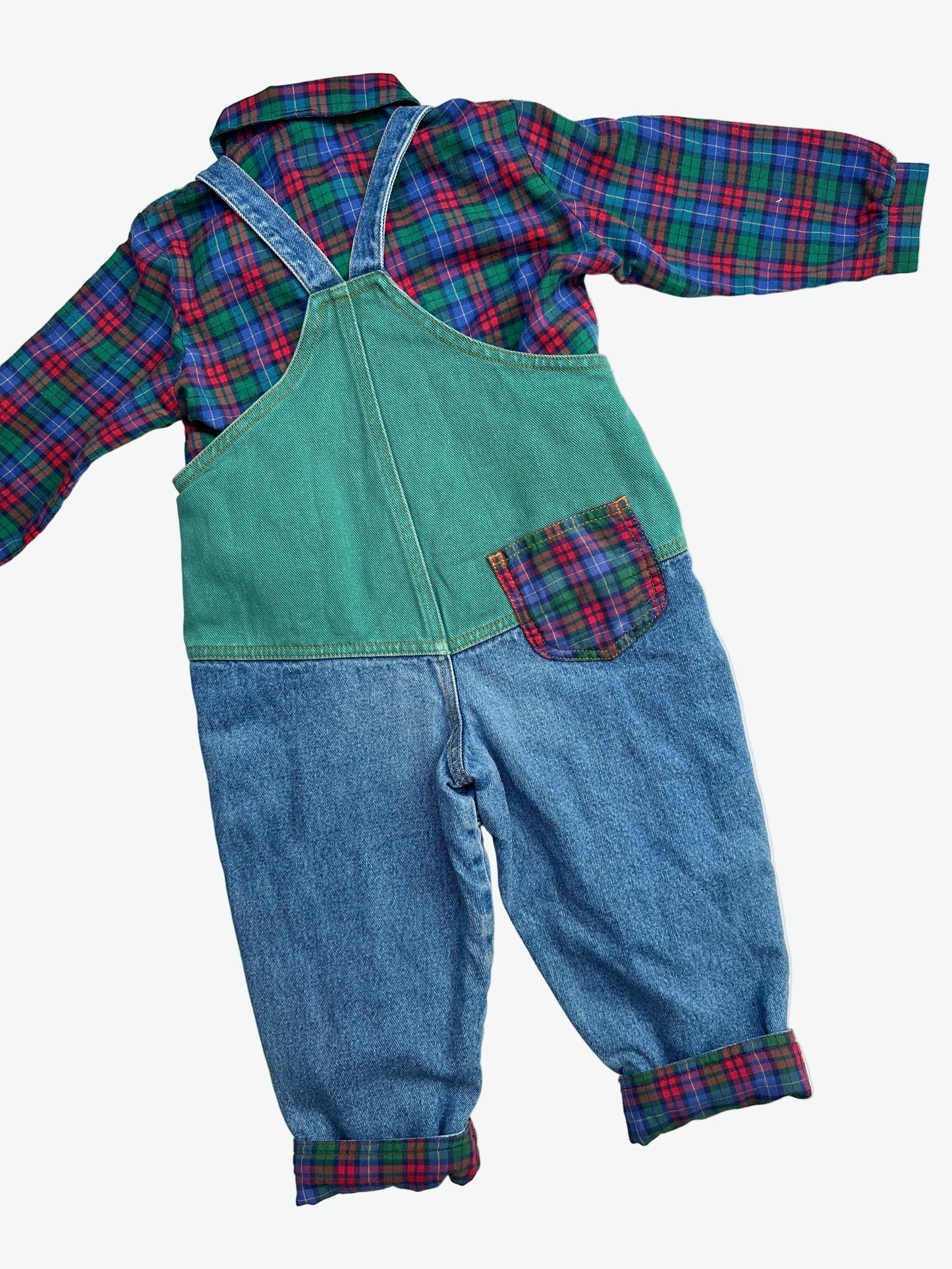 kids vintage colourful check shirt and denim dungarees on a white background