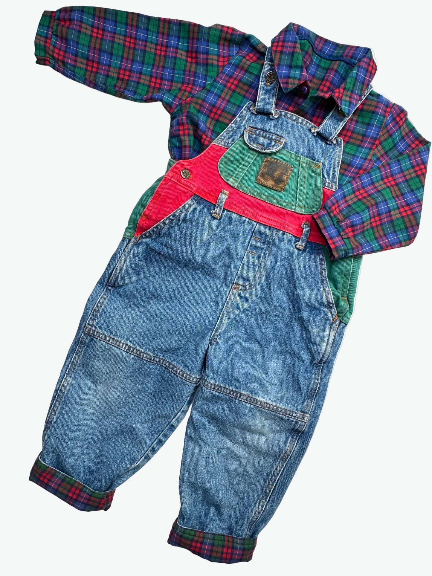 kids vintage colourful check shirt and denim dungarees on a white background
