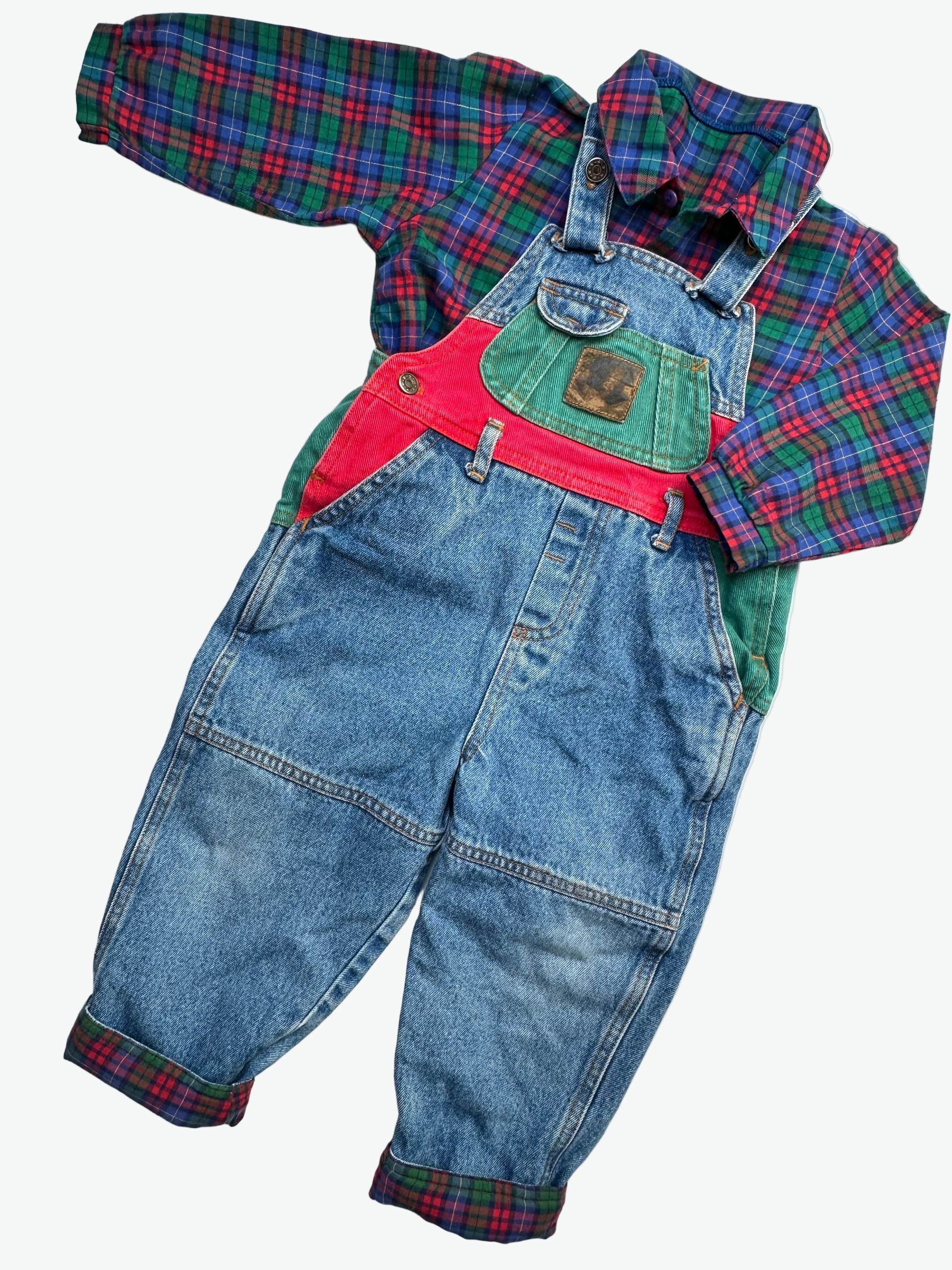 kids vintage colourful check shirt and denim dungarees on a white background