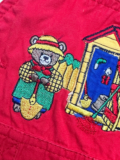 Kids vintage bold red with a relaxed bubble fit, featuring beautifully detailed embroidery or a bear tending the garden. Age 1 years.