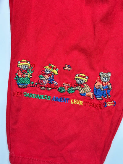 Kids vintage bold red with a relaxed bubble fit, featuring beautifully detailed embroidery or a bear tending the garden. Age 1 years.