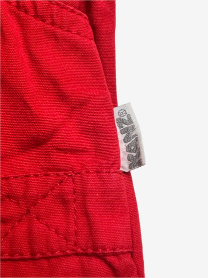 Kids vintage bold red with a relaxed bubble fit, featuring beautifully detailed embroidery or a bear tending the garden. Age 1 years.