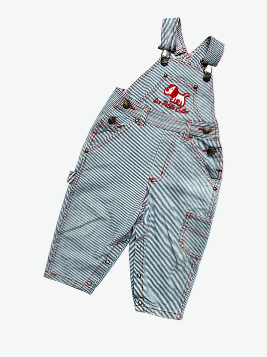 Kids vintage striped dungarees with contrast red stitching and a dog with the words'les petits calins'