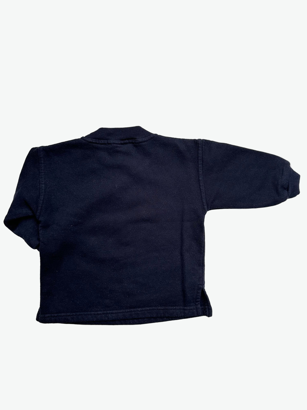 Black long-sleeve sweater with Furby Christmas print on a white background