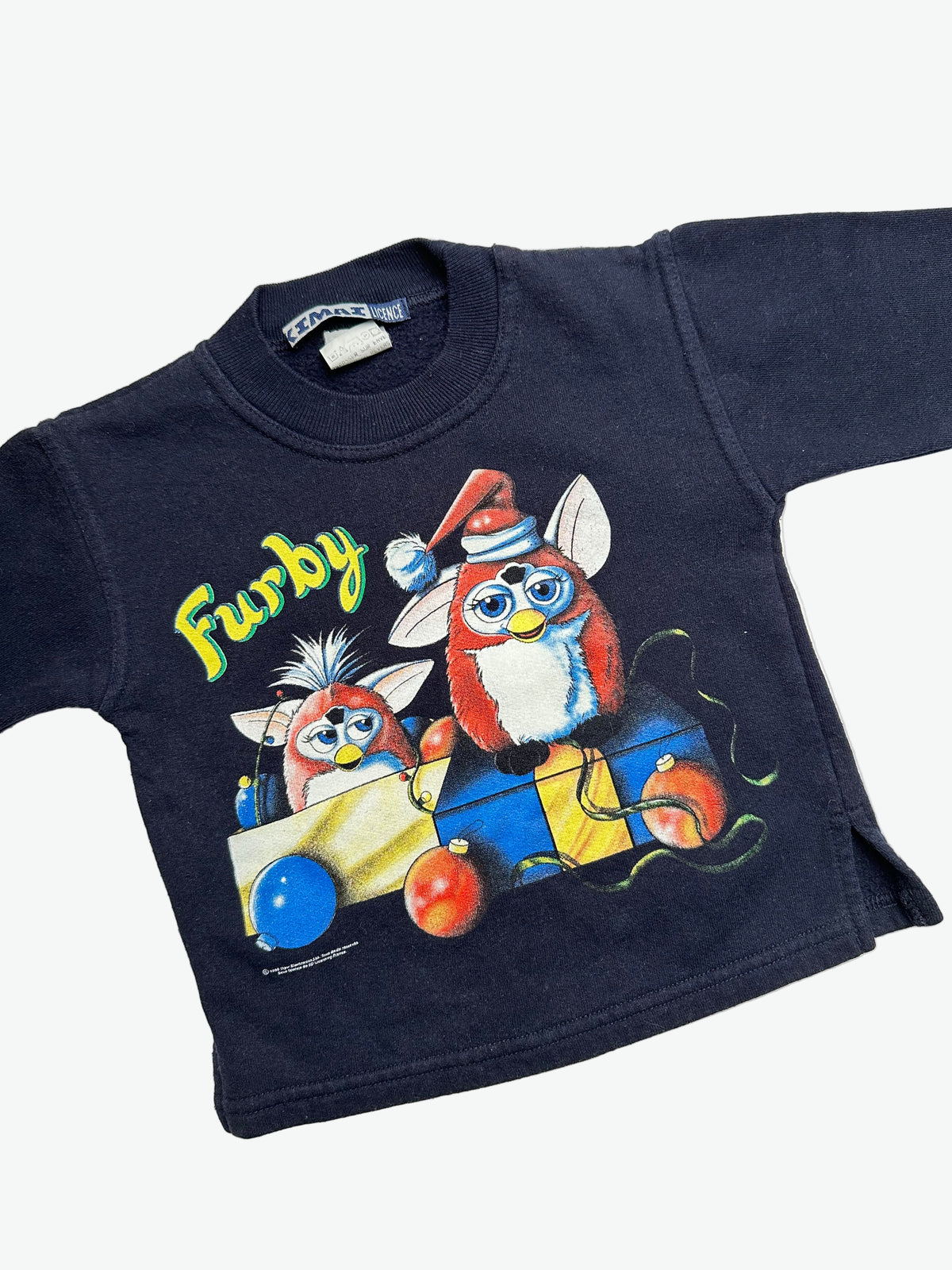 Black long-sleeve sweater with Furby Christmas print on a white background