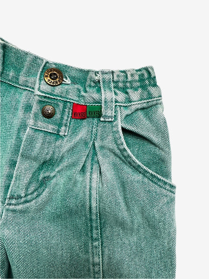 Kids vintage green denim jeans by Kickers, featuring an elasticated waist and button opening for an easy fit, the front darts and extra seams highlight the stunning wash effects, finished with the signature red and green Kickers tabs. Age 2 years.