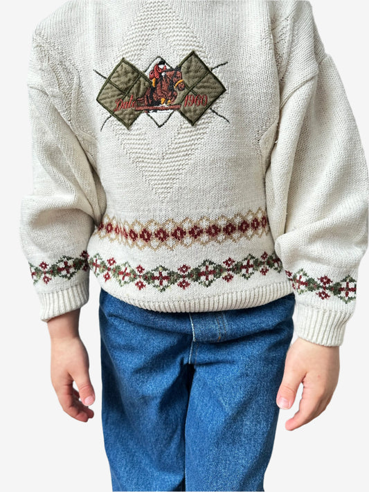 Kids Vintage cream colour lightweight knIt jumper with horse rider patch and embroidery on the chest and beautiful border patterns. Age 6 years.