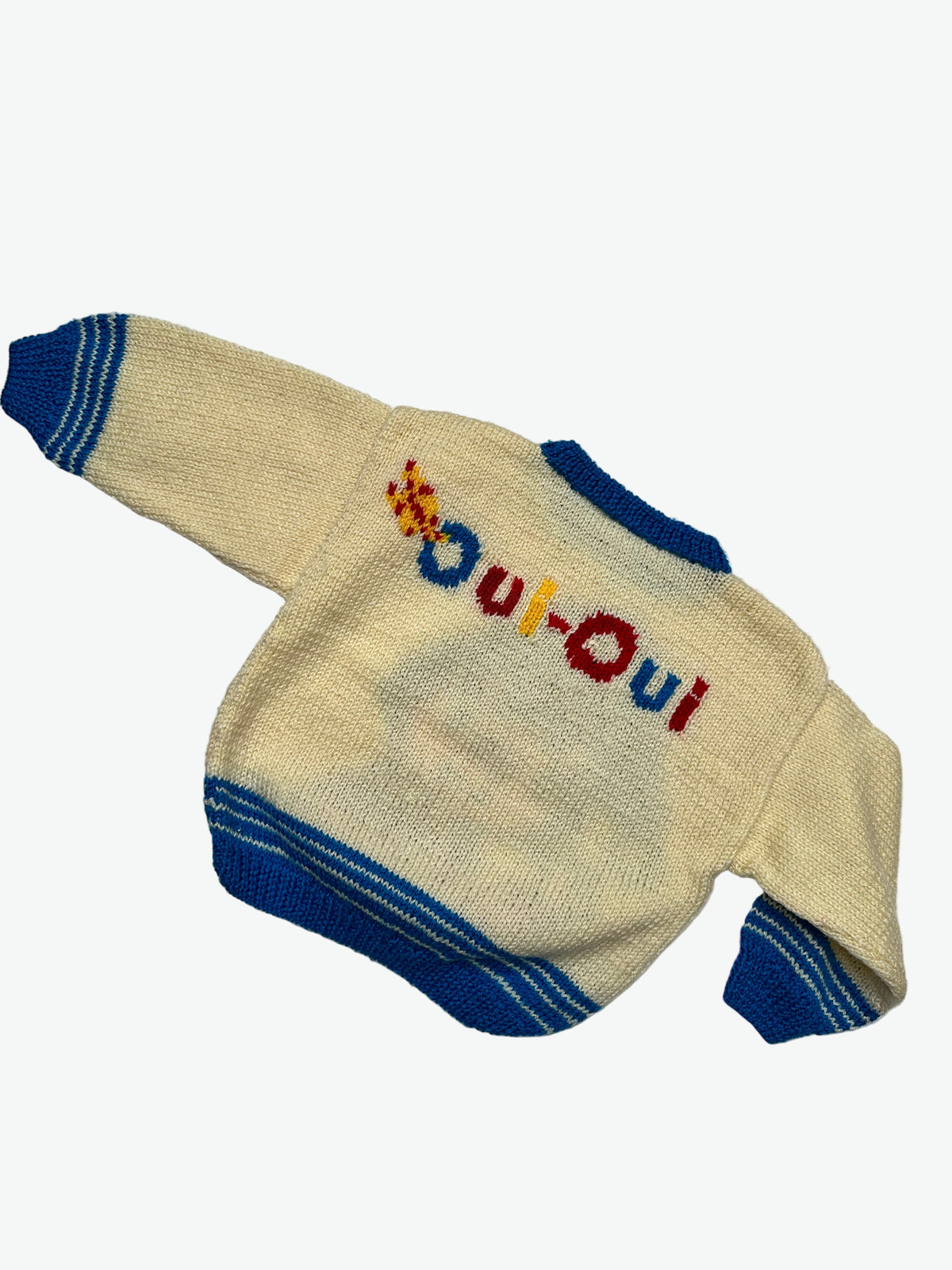 Kids vintage cream knitted jumper with colourful text and blue stripes at the hem and cuffs on a white background