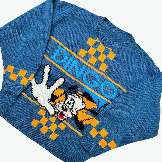 Kids vintage knit jumper with a dog illustration and 'Dingo' text on a blue  background with yellow checkerboard details.