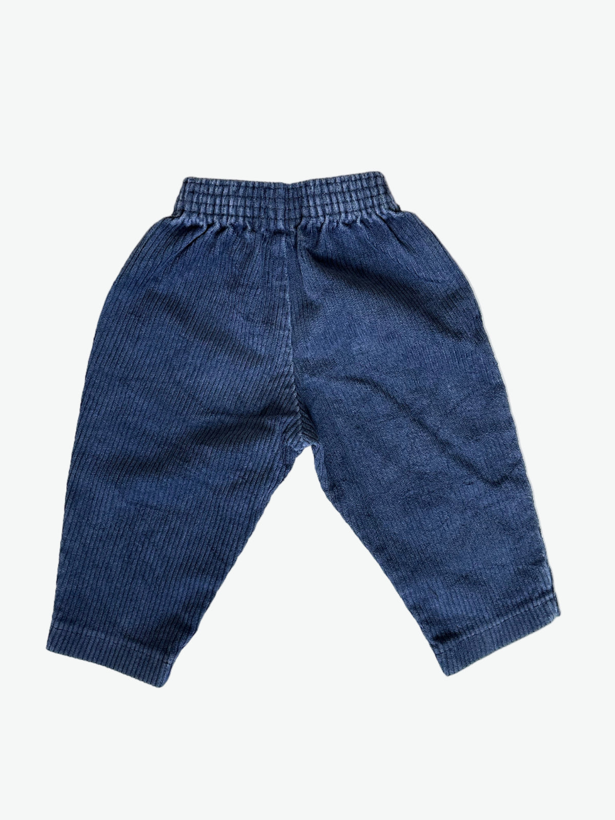 Kids vintage Inky Blue corduroy pants on a white background