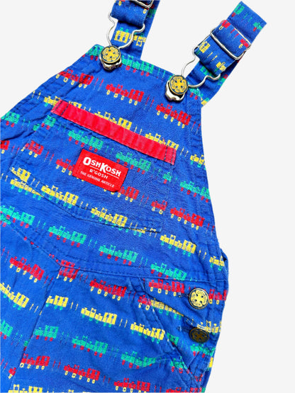 Kids vintage OshKosh short dungarees, with allover multi-colour train embroidery - very special. Age 18 months. Made in USA.