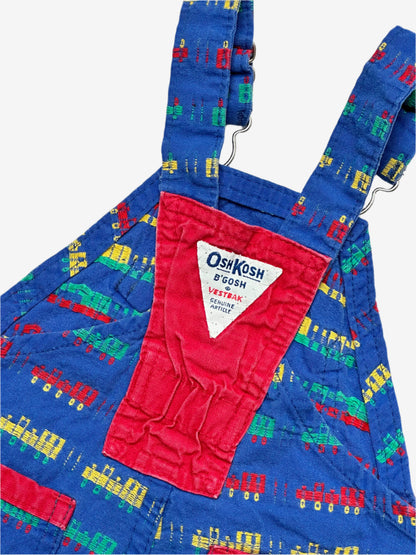 Kids vintage OshKosh short dungarees, with allover multi-colour train embroidery - very special. Age 18 months. Made in USA.