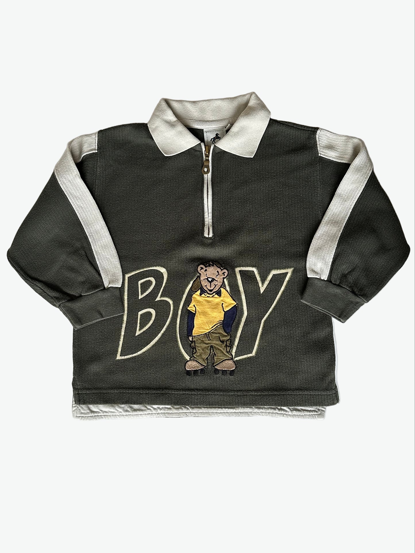 Kid vintage khaki green long sleeve polo shirt with white accents and a bear graphic on a white background.