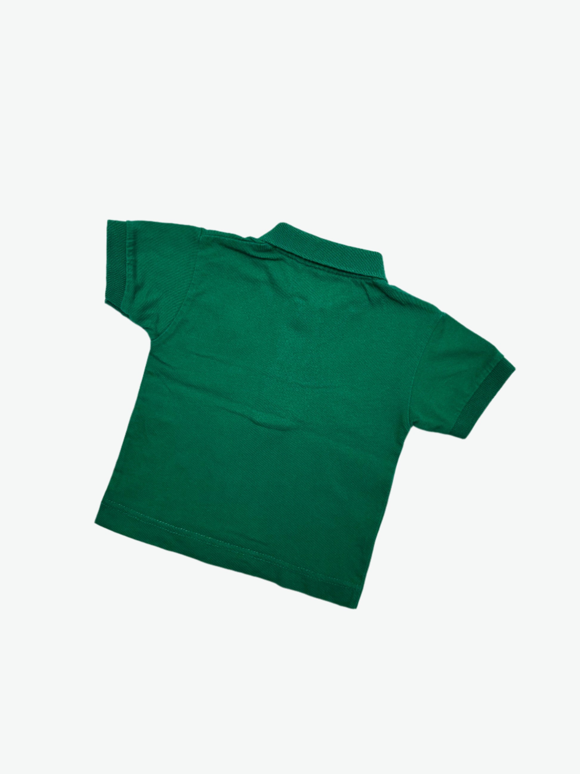 Kids vintage polo shirt in forest green with embroidery detail. Age 6 months.