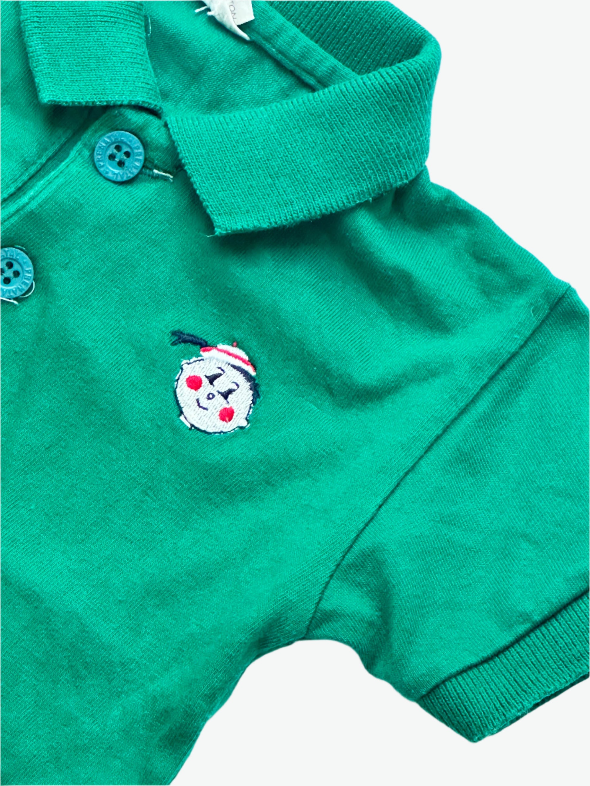 Kids vintage polo shirt in forest green with embroidery detail. Age 6 months.