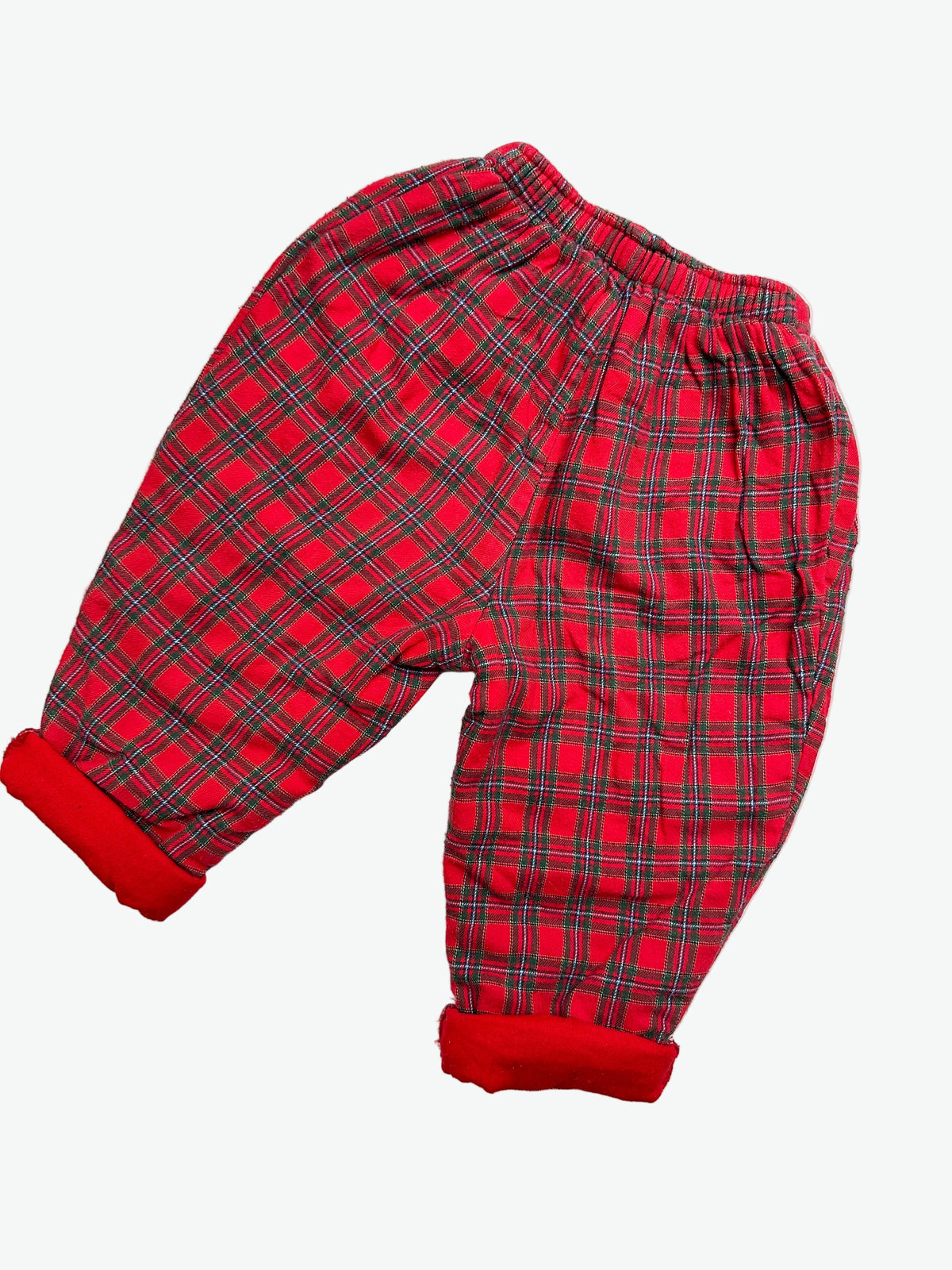 Lined Red check trousers on a white background
