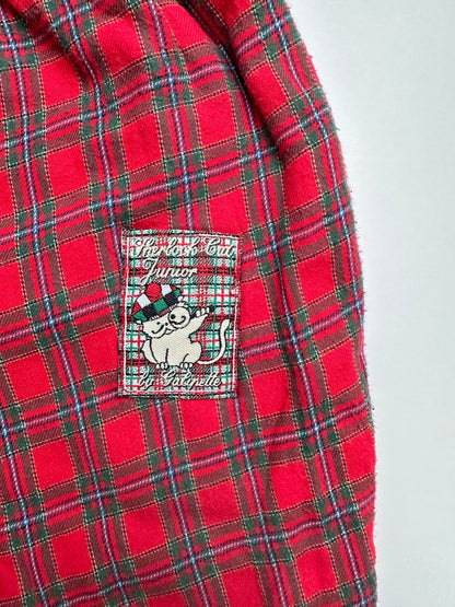 Lined Red check trousers on a white background