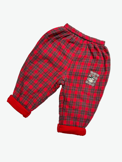 Lined Red check trousers on a white background