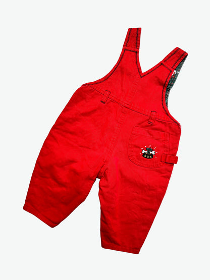 Kids vintage Red dungarees with a little dog embroidery on a white background
