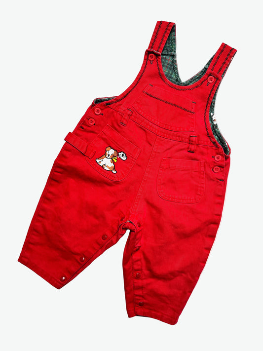 Kids vintage Red dungarees with a little dog embroidery on a white background