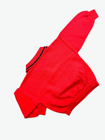 Red and grey collared jumper with the power rangers on the front on a white background