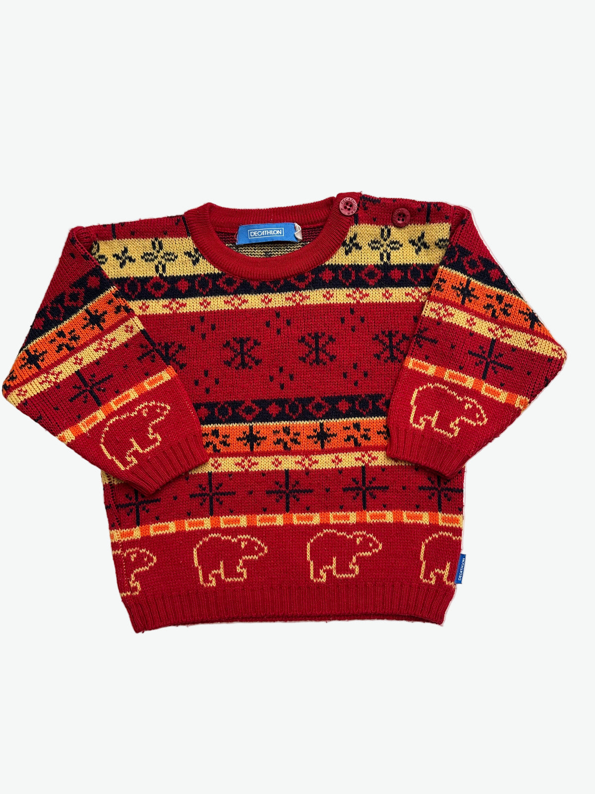 Kids vintage red sweater with snowflake and polar bear pattern on a white background