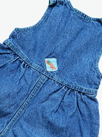 True Blue denim romper with a colourful patch on a white background
